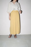 early work of DRIES VAN NOTEN, pleated front design wrap pencil skirt in beautiful pale yellow color