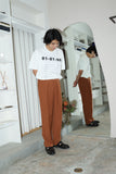 80's linen tuck trousers in dusty orange