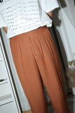 80's linen tuck trousers in dusty orange