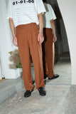 80's linen tuck trousers in dusty orange