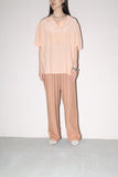 90’s rayon tuck trousers in nudie baby pink color