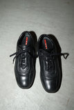 PRADA leather lace-up sneakers