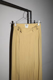 early work of DRIES VAN NOTEN, pleated front design wrap pencil skirt in beautiful pale yellow color